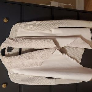 Tan suede front sweater material in the back